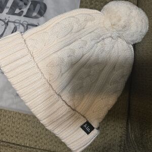 Cozy Cream Knit Pom-Pom Beanie for Women. Kin APPAREL SATIN LINED HAT ORIGINAL